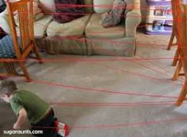 Yarn spider web in a room