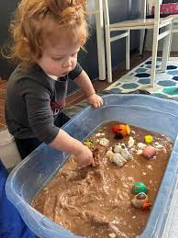 Farm animal mud rescue sensory bin